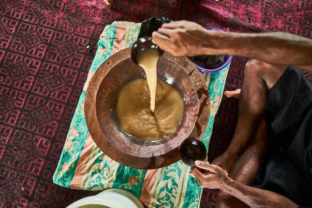 Traditional kava in a coconut shell bowl
